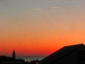 Flogi� yfir Siglufj�r�. Lj�smyndari og fr�ttama�ur; Le� �lason